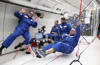 Walking in the air: University of 91 researchers touch down after testing ground-breaking devices in zero gravity